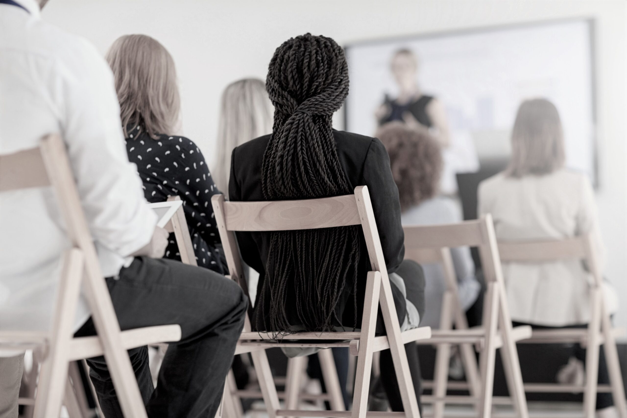 Rearview shot of an audience of businesspeople